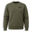 An olive green crewneck sweatshirt with a small black embroidered 'Dux' logo on the left chest, displayed against a clean white background.