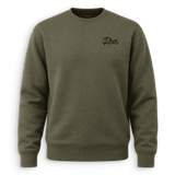 An olive green crewneck sweatshirt with a small black embroidered 'Dux' logo on the left chest, displayed against a clean white background.