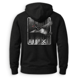 A black pullover hoodie shown from the back, featuring a large graphic print of a flying duck over a wood-plank background with the word 'DUX' in distressed white letters.