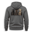 A dark gray pullover hoodie shown from the back, featuring a graphic print of three dogs in a marsh with the text 'DUX WATERFOWL CO.' underneath.