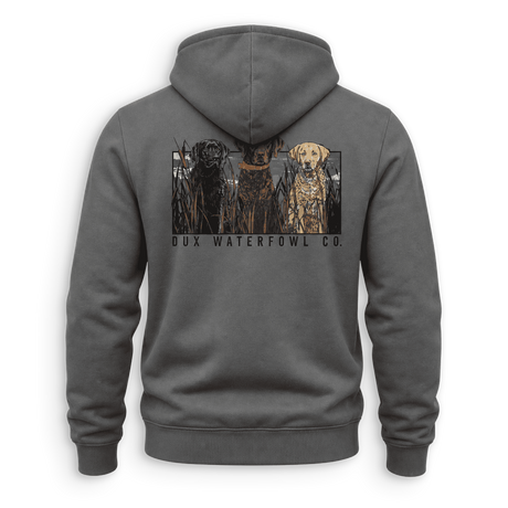 A dark gray pullover hoodie shown from the back, featuring a graphic print of three dogs in a marsh with the text 'DUX WATERFOWL CO.' underneath.