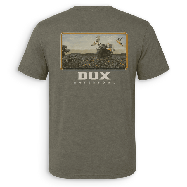 Back view of a green short-sleeved Dove shirt with a hunting scene graphic and the 'DUX' brand logo on the back

