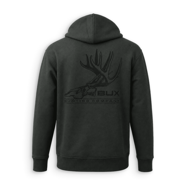 A dark charcoal gray zip-up hoodie shown from the back, featuring a tonal black graphic of a deer skull with antlers and the text 'BUX HUNTING COMPANY'.