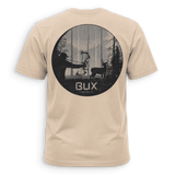 A beige crewneck t-shirt with a black graphic print on the back, featuring a circular hunting scene with a bowfied deer and the text 'BUX HUNTING CO.' in white, set against a solid green background.