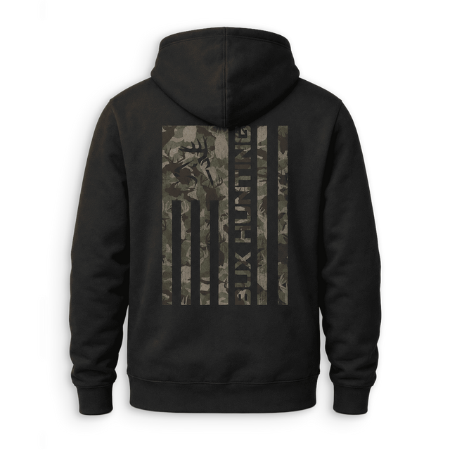 A black pullover hoodie shown from the back, featuring a large vertical American flag graphic on the back in a camouflage pattern with a deer head silhouette and the text 'BUX HUNTING'.