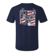 A navy blue short-sleeve t-shirt shown from the back, featuring a distressed graphic of a deer head with antlers set against an American flag pattern.