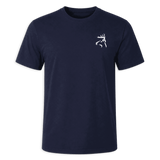 A navy blue short-sleeve crewneck t-shirt with a small white buckmark logo on the left chest, displayed against a solid green background.