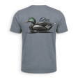 dux waterfowl light blue shirt with a mallard decoy centered on the back of the shirt
