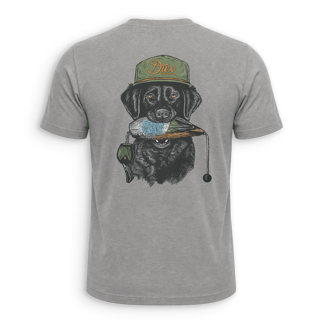 A heather gray short-sleeve t-shirt shown from the back, featuring a large graphic print of a black dog wearing an olive green cap with 'Dix' written on it and holding a blue and orange duck in its mouth.
