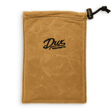 A tan canvas drawstring pouch with a black embroidered logo reading 'Dux Waterfowl Co.' in the center, shown on a plain white background.