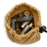 A tan canvas drawstring pouch filled with gray and gold shotgun shells, shown from a top-down view on a white background.