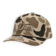 A baseball cap in a beige, brown, and black camouflage pattern, featuring a prominent metallic bronze 'Dux Waterfowl' logo on the front panel.