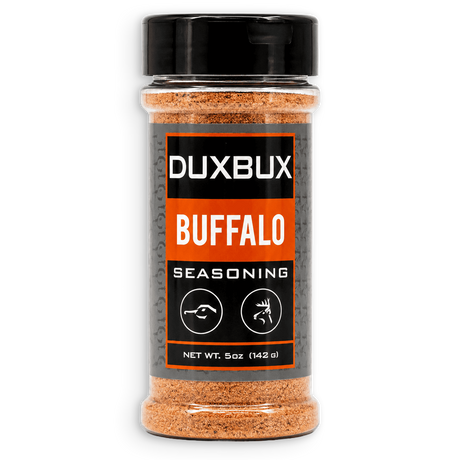 A 5 oz clear plastic bottle of Duxbux Buffalo Seasoning with a black cap and a black, gray, and orange label, set against a plain white background.