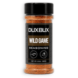 A clear plastic spice jar of DUXBUX Wild Game Seasoning with a black lid and black label, showing orange-brown seasoning inside, on a white background.