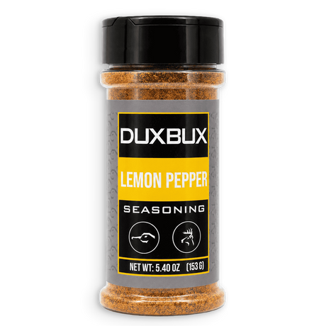 A clear plastic spice jar of Duxbux Lemon Pepper Seasoning with a black lid and a gray, black, and yellow label, set against a plain white background.