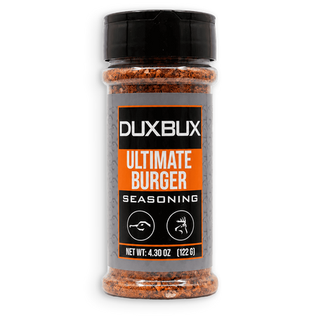 A clear plastic bottle of DuxBux Ultimate Burger Seasoning with a black cap and a gray, orange, and black label, set against a plain white background.